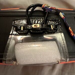 Black and Clear bag charm. Perfect for earbuds